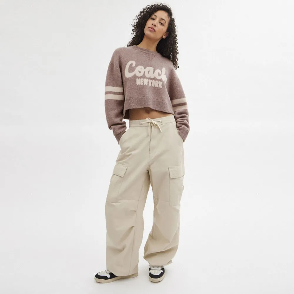 CROPPED COACH SWEATER