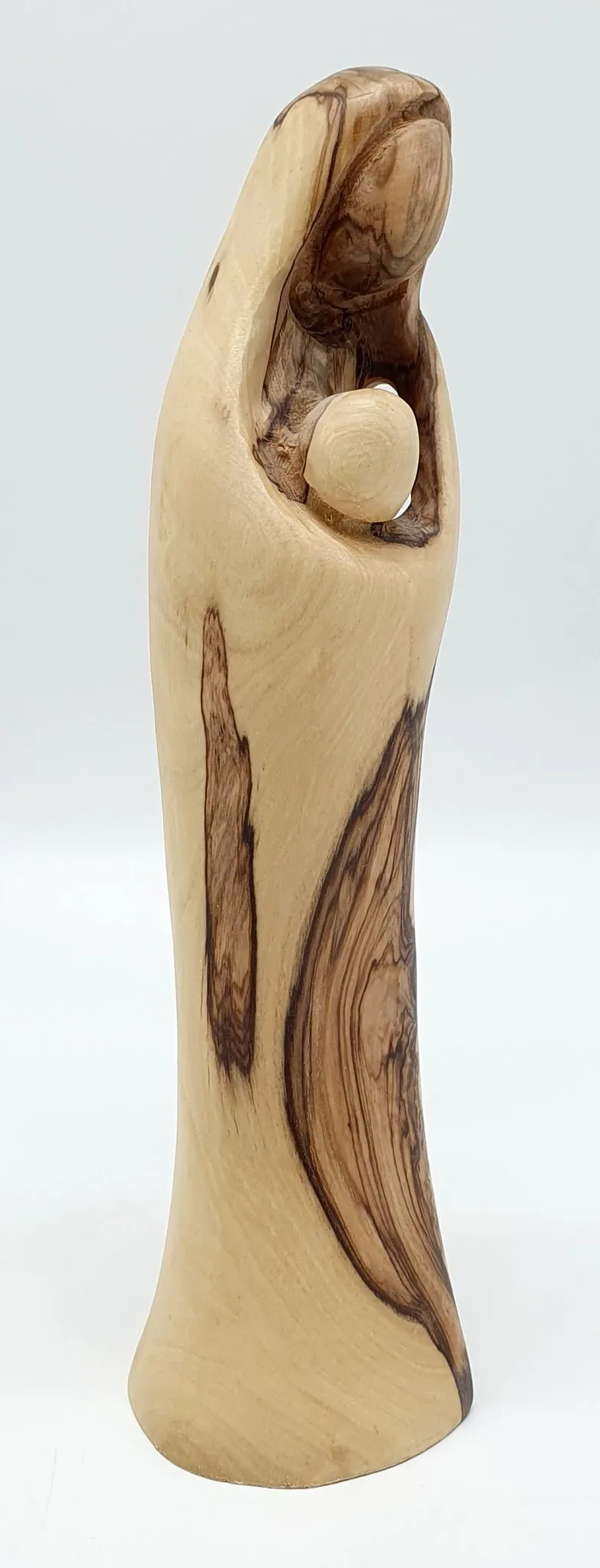 Experience the sublime beauty and intricate detailing of our Mary and Baby Jesus Handcrafted Olivewood Statue by Zuluf