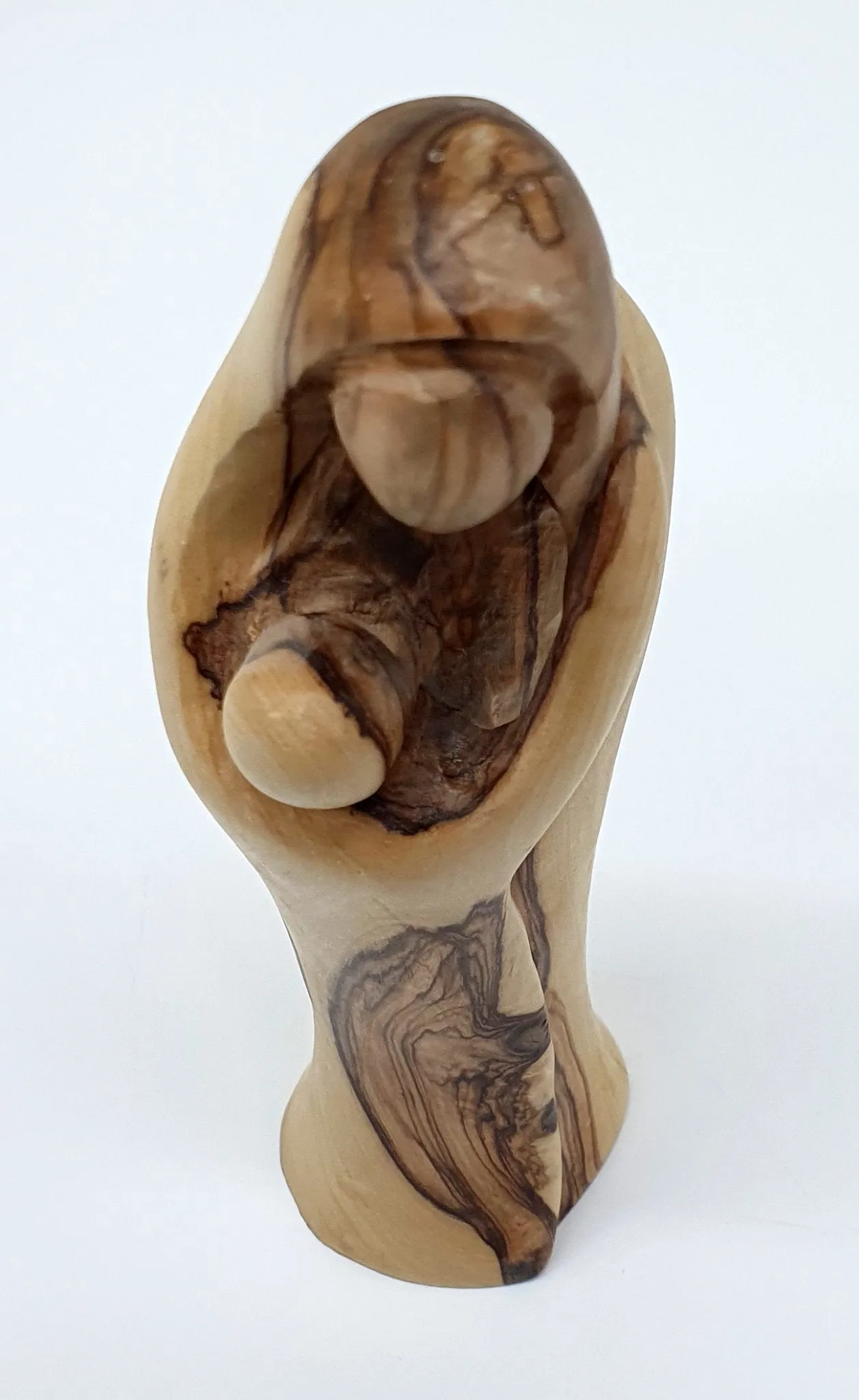 Experience the sublime beauty and intricate detailing of our Mary and Baby Jesus Handcrafted Olivewood Statue by Zuluf