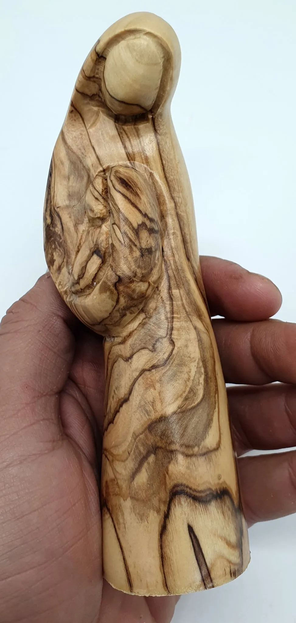 Grace your home with the timeless beauty of the Virgin Mary and Baby Jesus Handcrafted Olivewood Statue by Zuluf