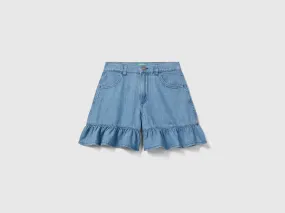 Lightweight denim jeans with frill - Light Blue | Benetton