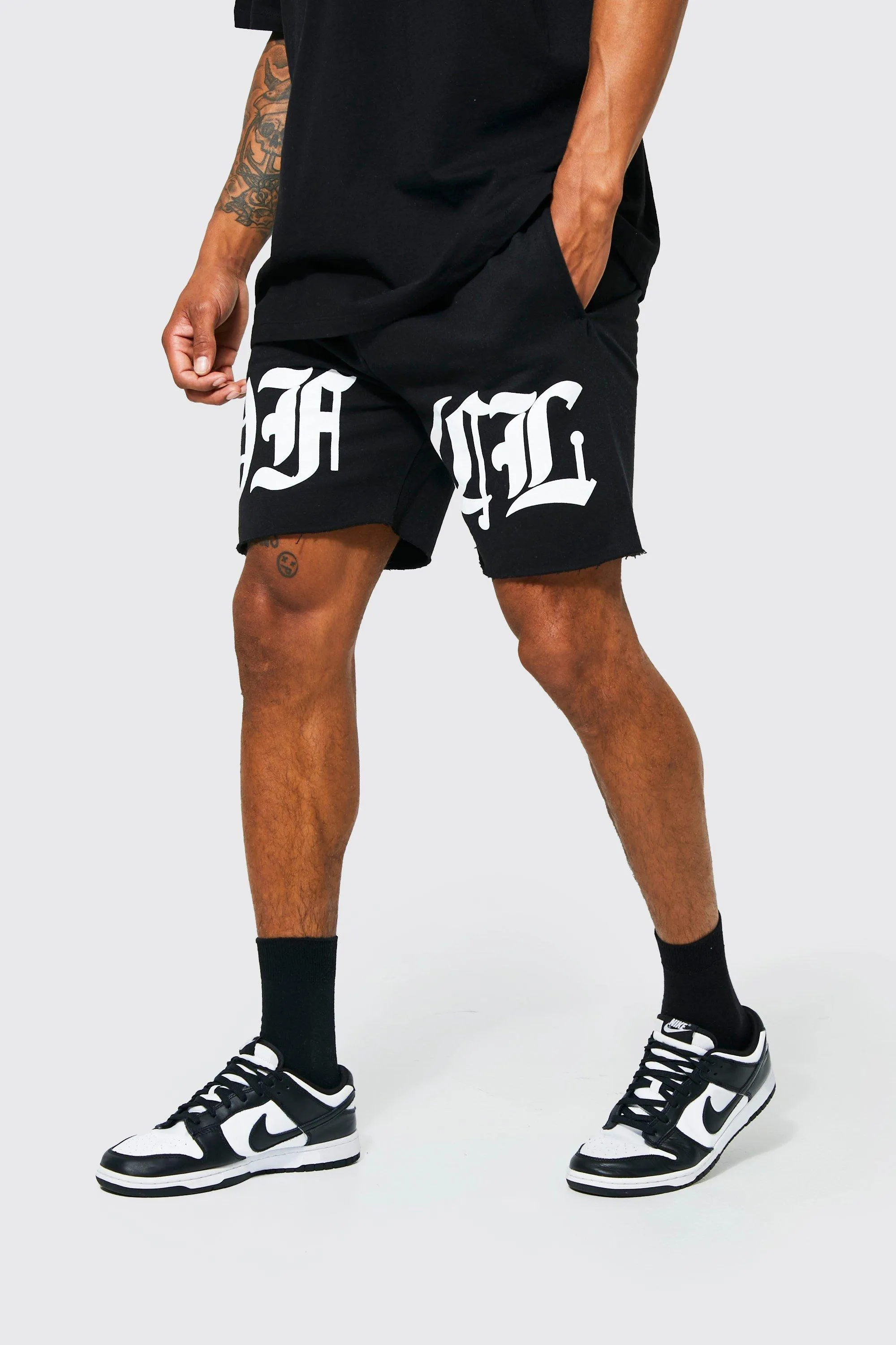 Shorts Length Raw Hem Graphic Jersey Shorts