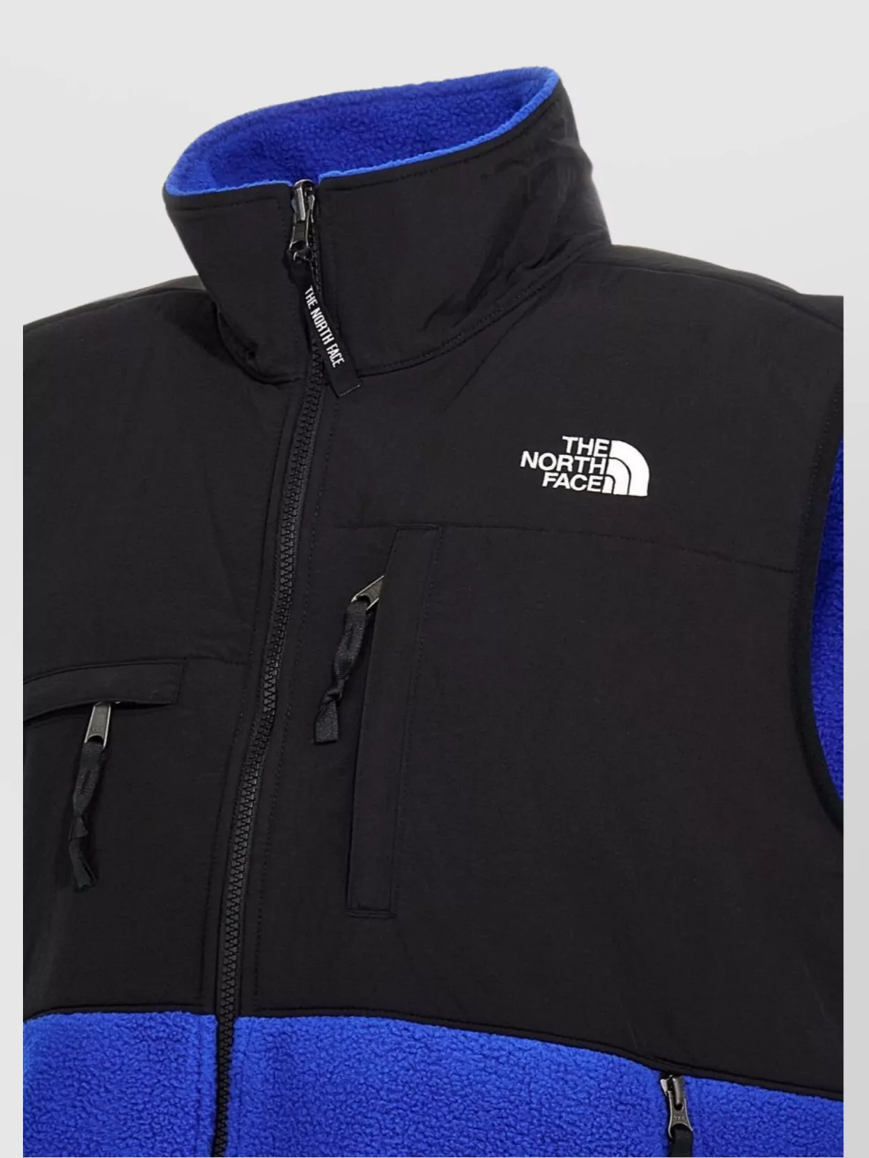 The North Face   Denali vest with chest and side zip pockets